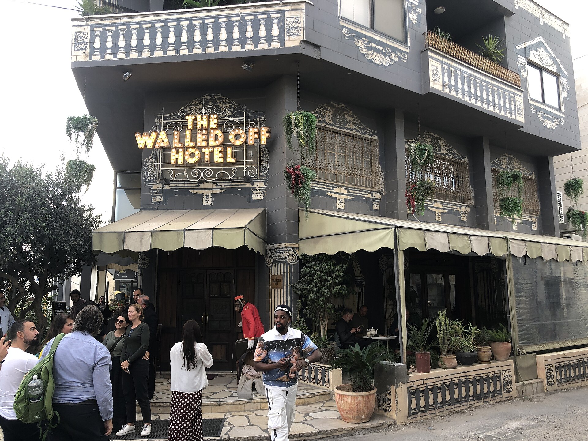 The entrance to The Walled Off Hotel in Bethlehem, opened in 2017 — the nine-room guesthouse facing the Israeli West Bank barrier.